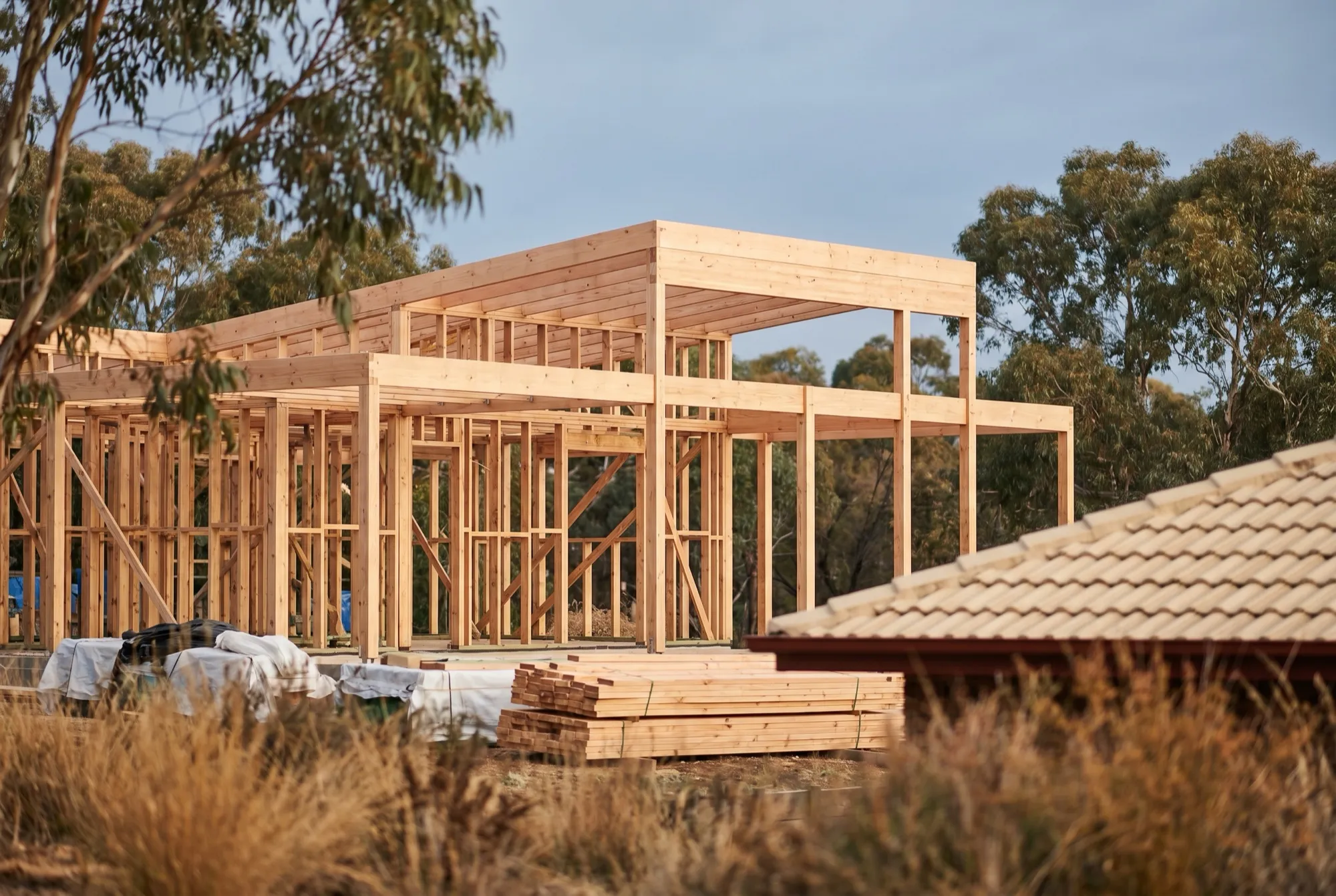 The timber frame of an Australian home extension under construction